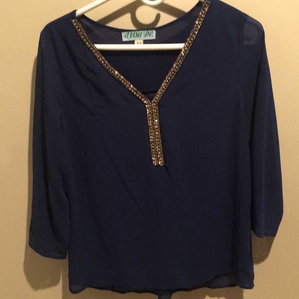 Royal blue blouse with accent collar.